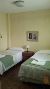 A bed or beds in a room at Alto Rio Hondo