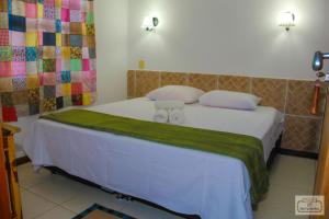 Кровать или кровати в номере Pousada Sempreviva