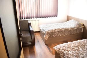 سرير أو أسرّة في غرفة في Vila Premijer Divčibare
