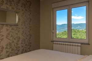Nespecifikovaný výhled na hory nebo výhled na hory při pohledu z apartmánu