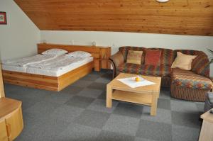 Postel nebo postele na pokoji v ubytování Molo Užeiga Inn