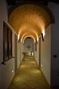 a hallway in a building with a brick ceiling at B&B Anemos in Morciano di Leuca