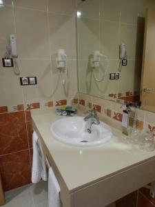 Phòng tắm tại Hotel La Familia
