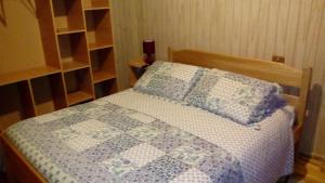 Postel nebo postele na pokoji v ubytování Hospedaje Los Calafates