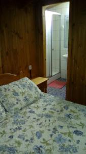 Postel nebo postele na pokoji v ubytování Hospedaje Los Calafates