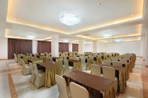 a conference room with tables and chairs in it at Grand Palace Hotel Sanur - Bali in Sanur +27 photos