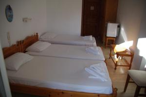 Ένα ή περισσότερα κρεβάτια σε δωμάτιο στο Hotel Marlton