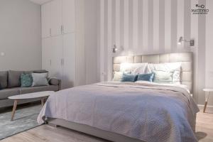 Posteľ alebo postele v izbe v ubytovaní Mateyko Apartment