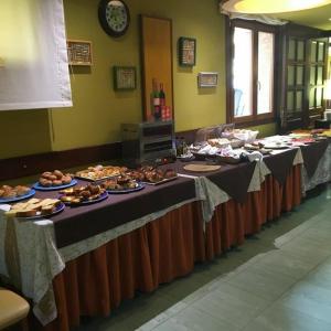 Un restaurante o sitio para comer en Alojamiento Calzada Romana