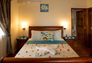Voodi või voodid majutusasutuse Seashell Beach Villa toas