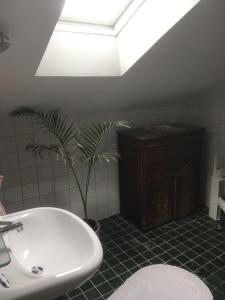 Ванна кімната в Stockholm B&B Cottage
