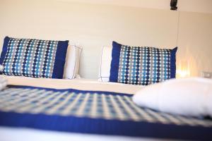 Giường trong phòng chung tại Bajaloglia Resort