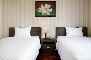 Postel nebo postele na pokoji v ubytování Mai Boutique Villa