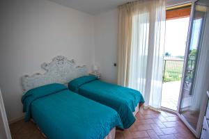 Postel nebo postele na pokoji v ubytování Residence Karina + 37 fotografií