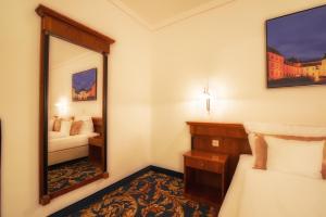 Postel nebo postele na pokoji v ubytování Hotel Bachmühle