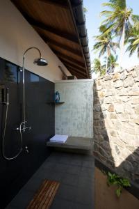 Koupelna v ubytování Jetwing Kottukal Beach House