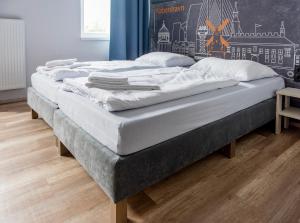 Postel nebo postele na pokoji v ubytování a&o Copenhagen Nørrebro