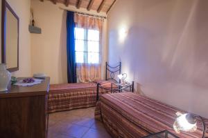 Posteľ alebo postele v izbe v ubytovaní Agriturismo Casetta I