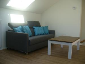 Ein Sitzbereich in der Unterkunft Ferienwohnung Rheinaue