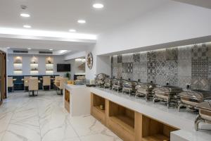 Kuchyň nebo kuchyňský kout v ubytování Harma Boutique Hotel