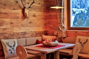 A seating area at Familyparadies GAMPLALM