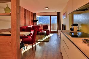 A seating area at Familyparadies GAMPLALM