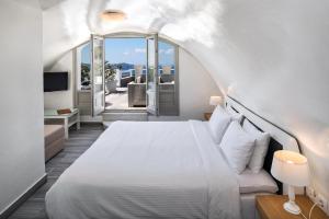 Voodi või voodid majutusasutuse Hotel Thireas toas