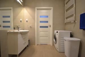 Koupelna v ubytování Grand De Luxe Solna + 28 fotografií