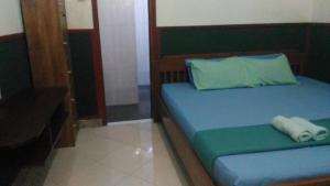 Letto o letti in una camera di ADA Homestay