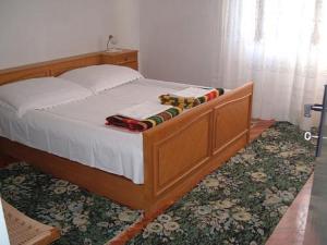 Кровать или кровати в номере Apartments Pintar