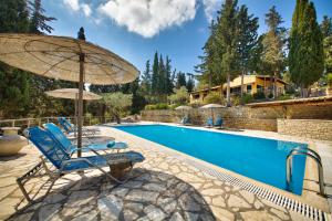 Bazén v ubytování Glyfada Beach Villas nebo v jeho okolí