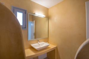Koupelna v ubytování Passos Villas
