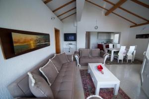 Posezení v ubytování Guest House Aldin