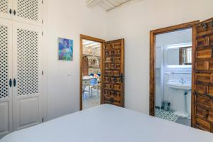 Postel nebo postele na pokoji v ubytování Casa Cecilia