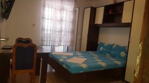Postel nebo postele na pokoji v ubytování Apartments Alissa