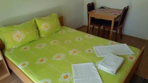 Postel nebo postele na pokoji v ubytování Apartments Alissa