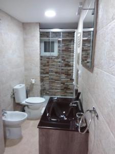 Kúpeľňa v ubytovaní Apartamentos Naranja y Limòn