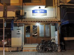 a group of bikes parked outside of a hotel at Delphi Hotel in Nicosia