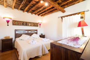 Katil atau katil-katil dalam bilik di Can Caseres