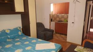 Postel nebo postele na pokoji v ubytování Apartments Alissa