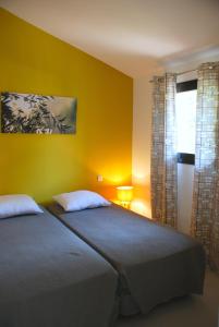 Postel nebo postele na pokoji v ubytování Mini Villa Santa