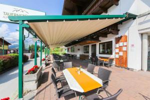Restoran ili drugo mesto za obedovanje u objektu Alpenhotel Tauernstüberl