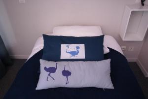 Cama ou camas em um quarto em Hotel de la Placette Barcelonnette