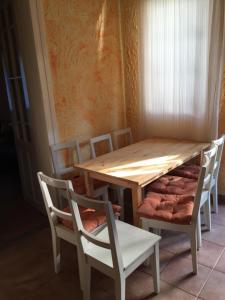 Posedenie v ubytovaní Pálma Apartmanház Siófok