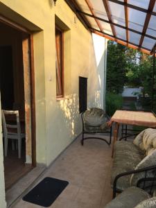 Posedenie v ubytovaní Pálma Apartmanház Siófok
