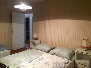 Posteľ alebo postele v izbe v ubytovaní Pálma Apartmanház Siófok