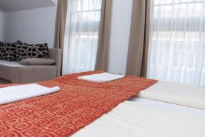Letto o letti in una camera di Hotel Logavina 8 Garage Parking