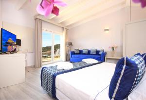 Giường trong phòng chung tại Bajaloglia Resort