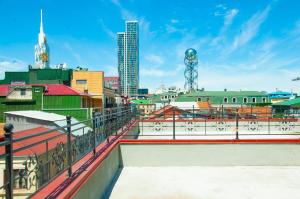 a view of the city from the roof of a building at Hotel Varios in Batumi