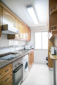 Kuchyň nebo kuchyňský kout v ubytování Apartamento Cardenal